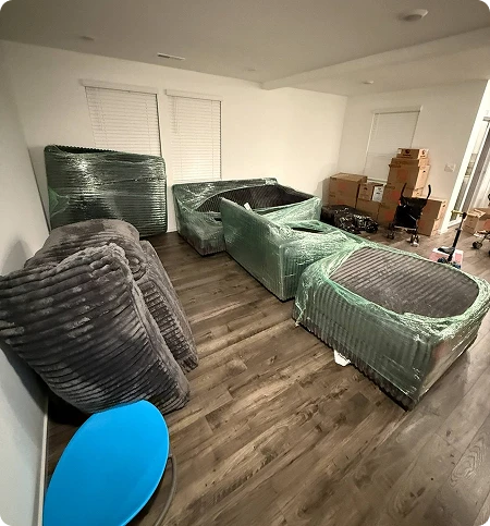 Carefully wrapped sofas and furniture for a residential move