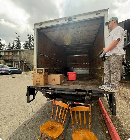 Professional mover loading household boxes in Vancouver WA